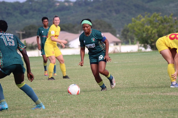 Hasaacas Ladies captain Linda Eshun initiates an attack into Nordsjealland 's half
